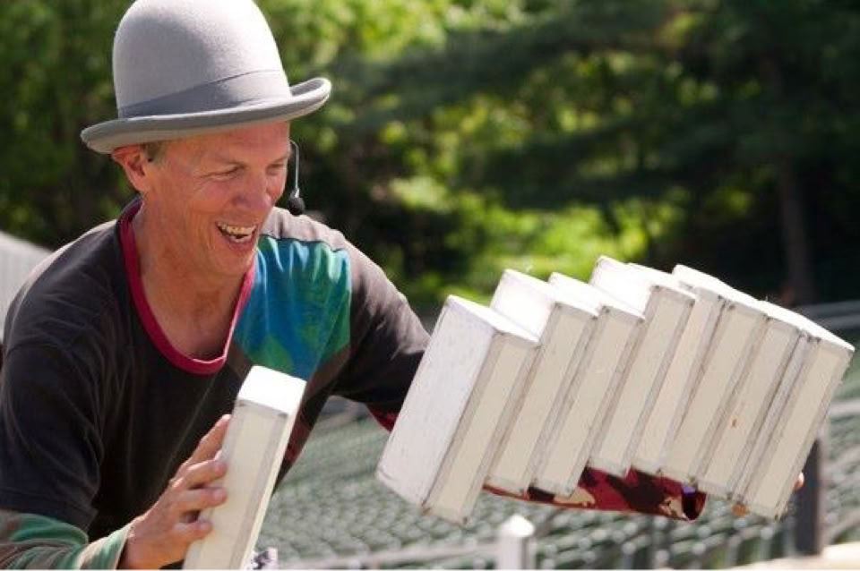 cigar box juggler smiling