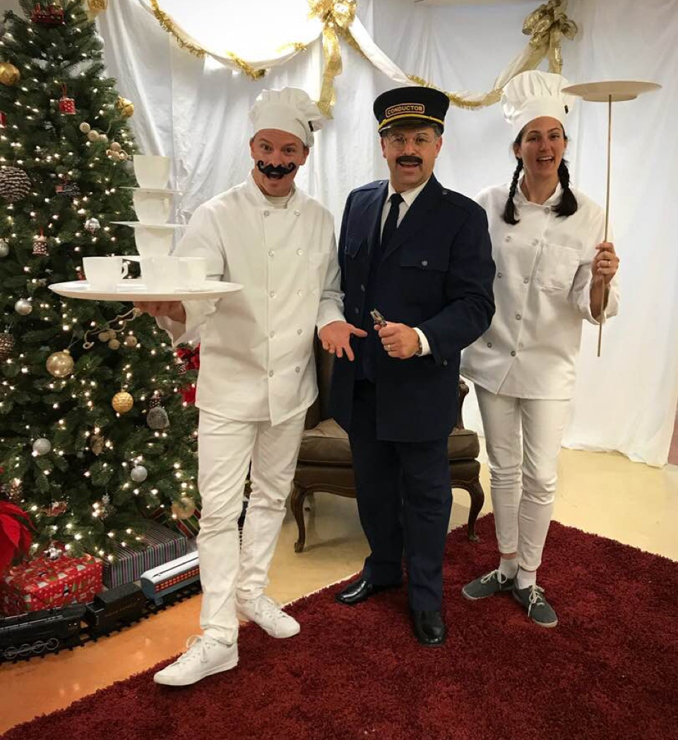3 performers in Polar Express costumes
