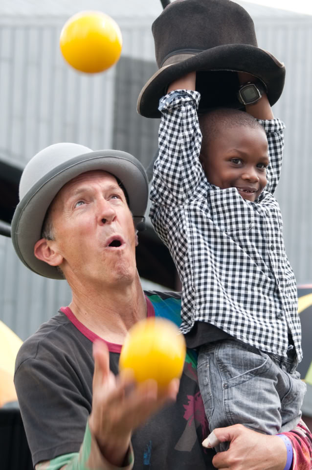 Nick juggling a child